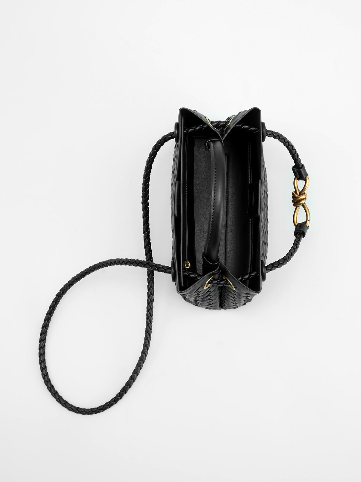 MAÉVA – Elegante borsa a mano con dettaglio a torsione in metallo